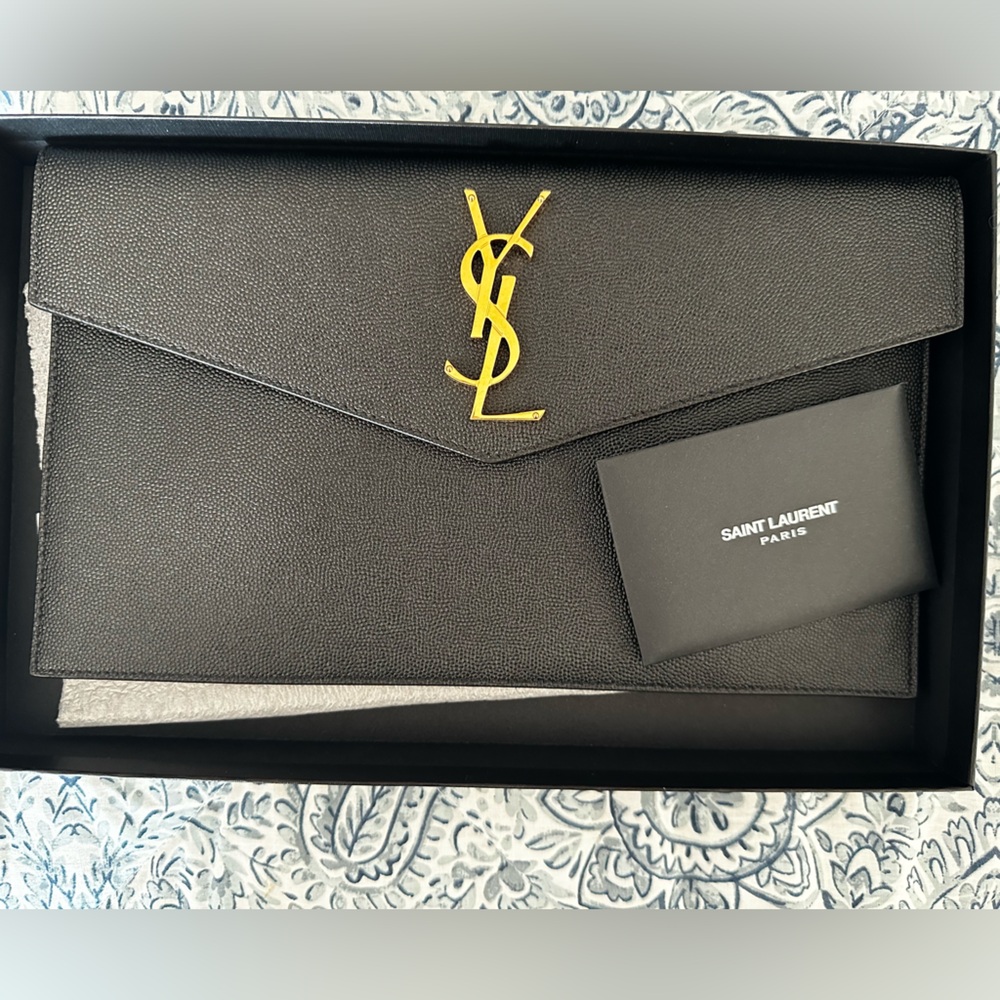 YSL medium pouches clutch.